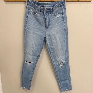 American Eagle Outfitters Light Wash Distressed Super Hi-Rise Jegging